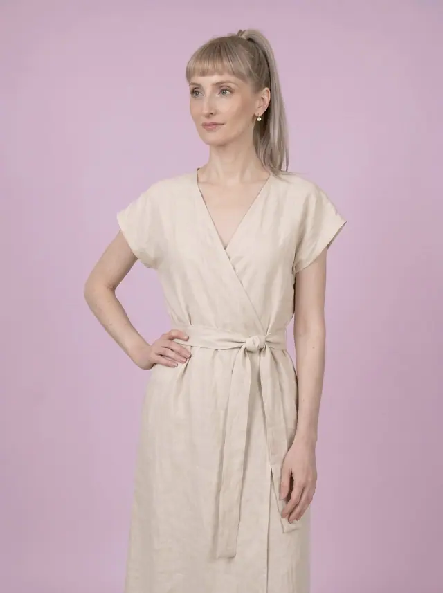 Beige linen wrap dress, three-quarter view
